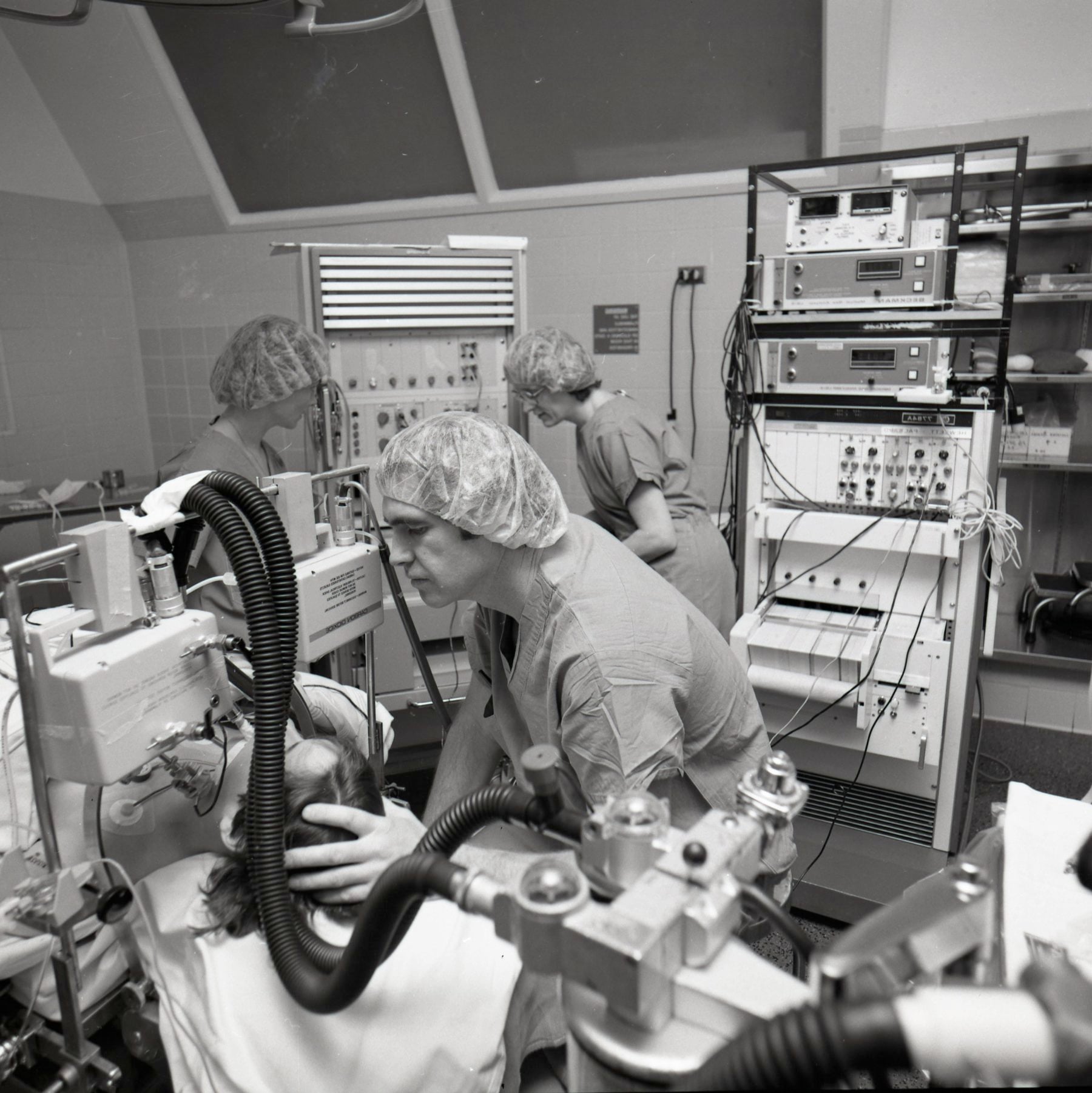 Doctor examining a patient during a medical procedure