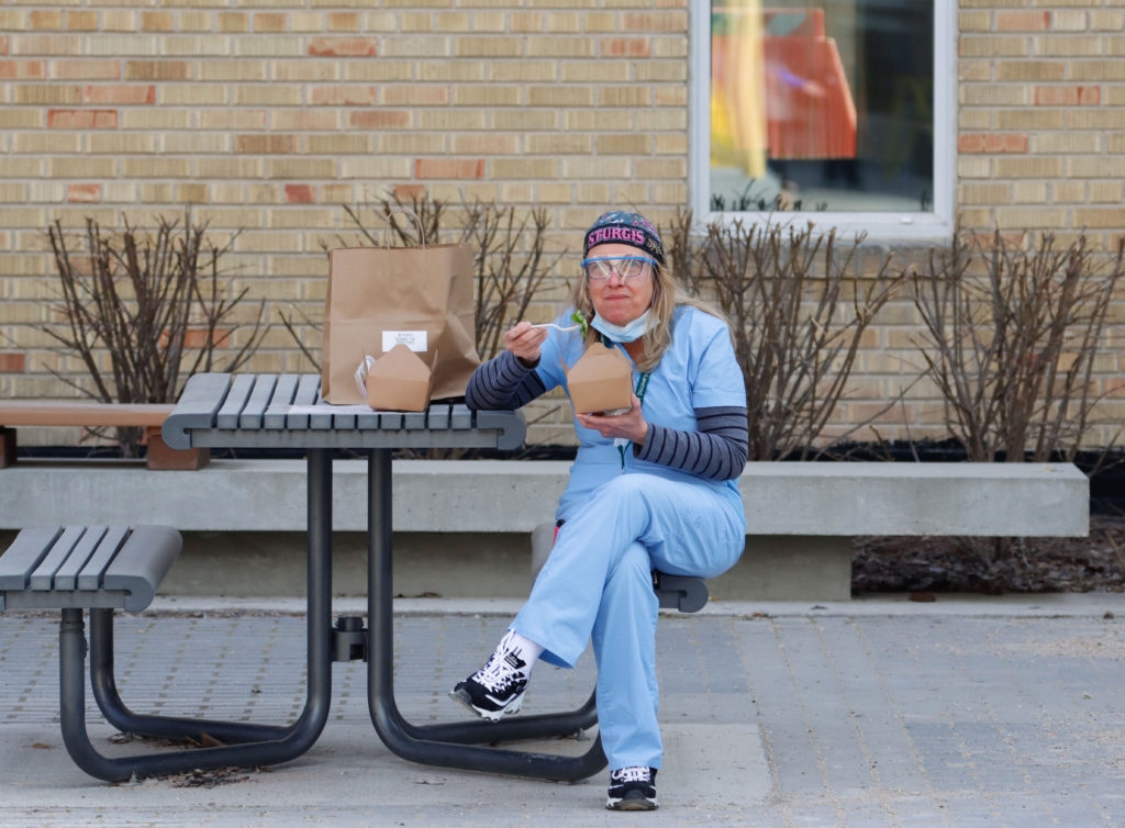 HSC nurse enjoying one of the donated meals