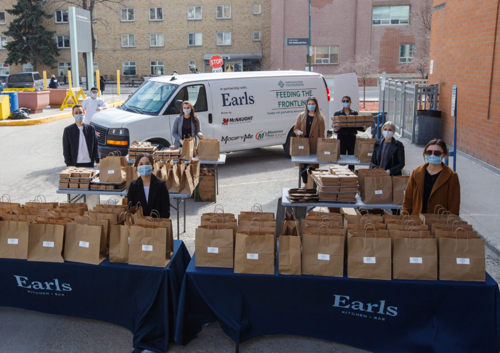 HSC staff distributing donated meals