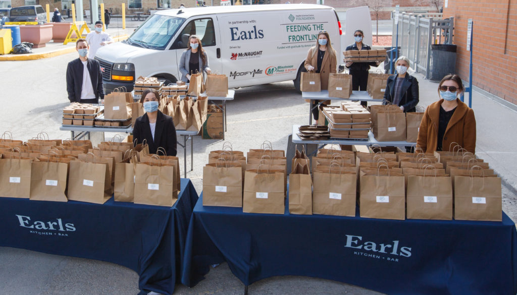 HSC staff distributing donated meals