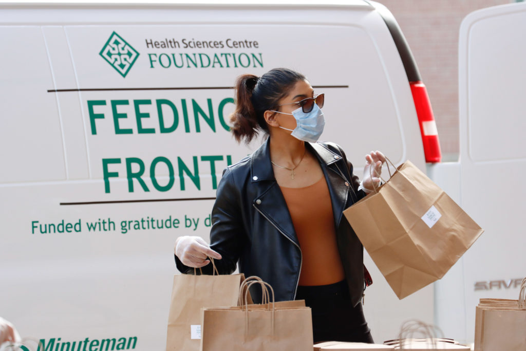 HSC staff distributing donated meals