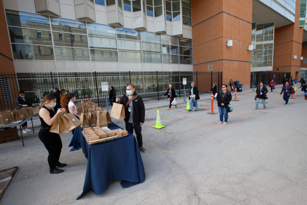 HSC staff members receiving donated meals