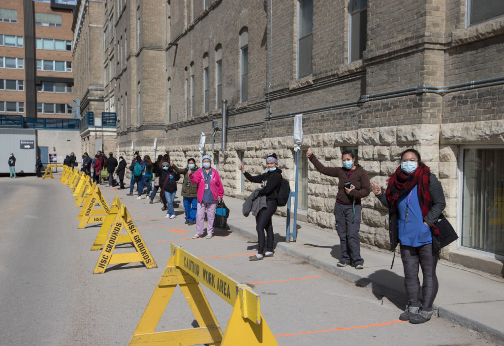 HSC staff lining up to receive donated meals