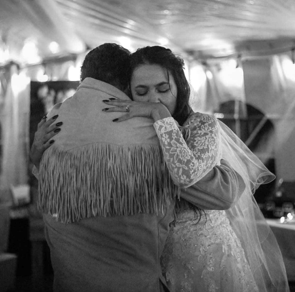 Vickie Murdock and her father Allen Bushie hugging